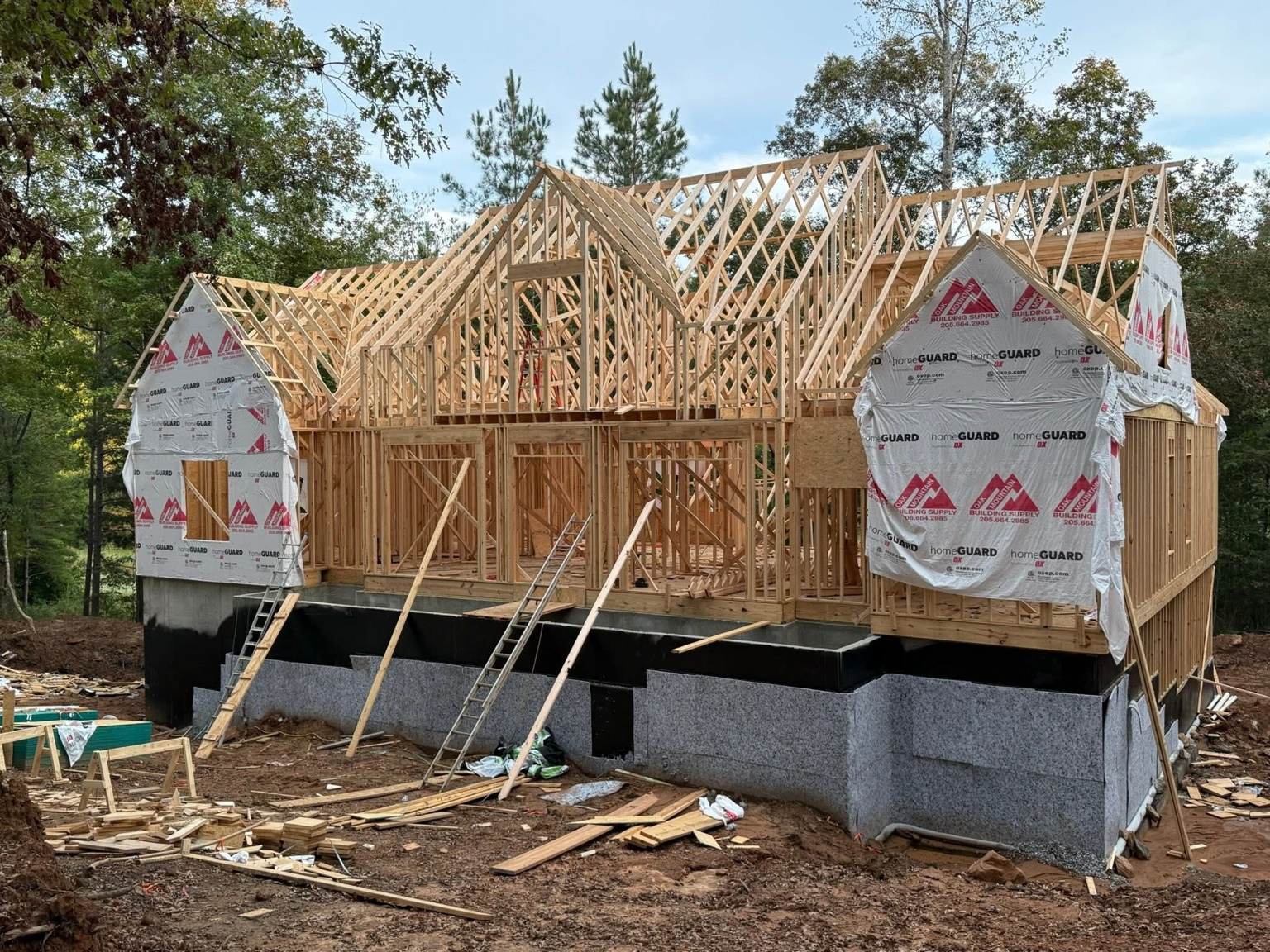 Roof trusses and timber framing on a lakefront custom home in Trussville, Alabama